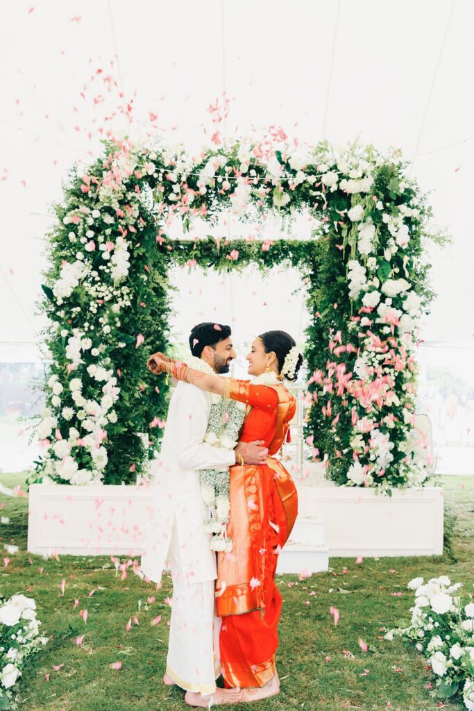 Bride and groom just married under mandap