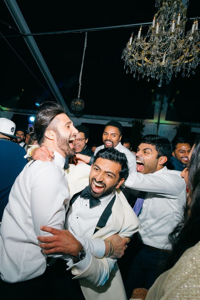 Groom dancing at his wedding