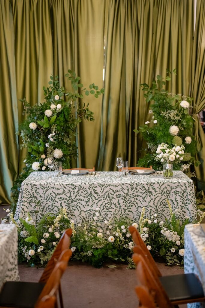 Green embroidered table linens