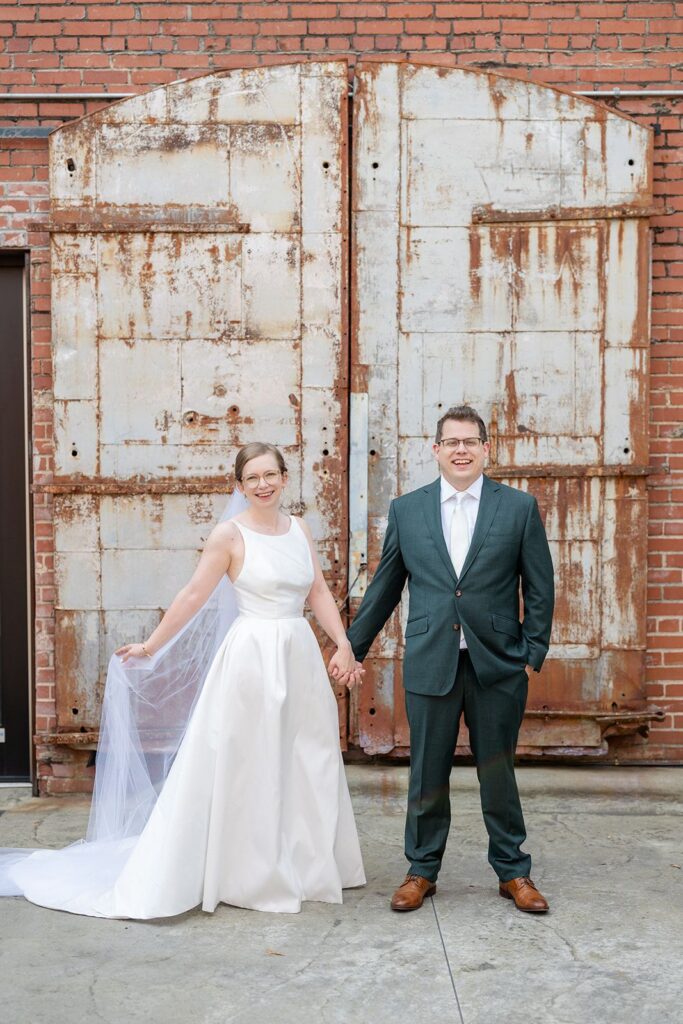 Bride and groom in the courtyard at the Cookery