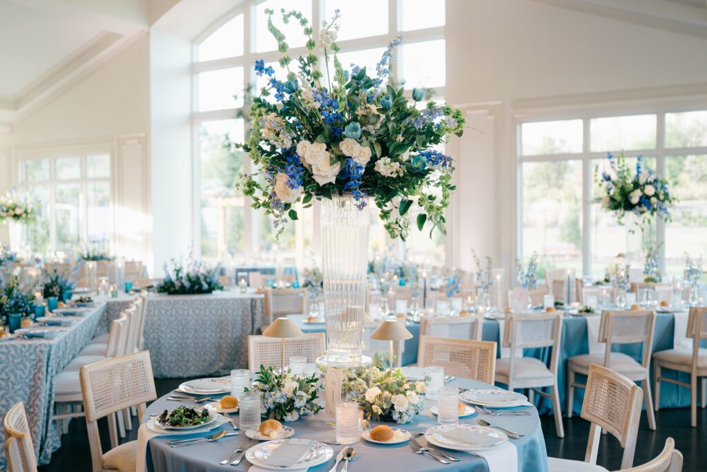 Blue delphinium centerpiece with lamps