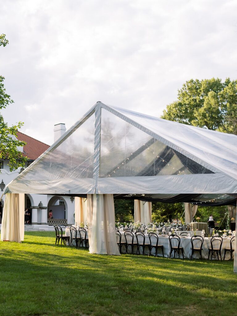 Clear top tent in front of Hill House in Durham