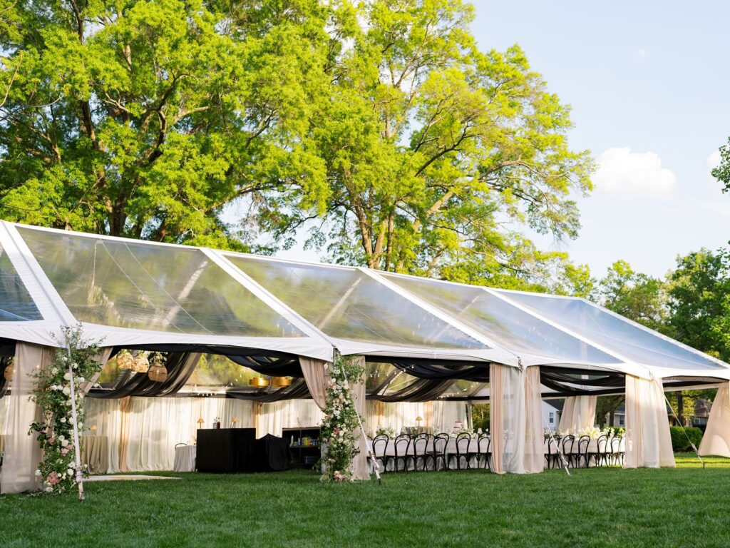 Clear top tent design with color blocked leg draping