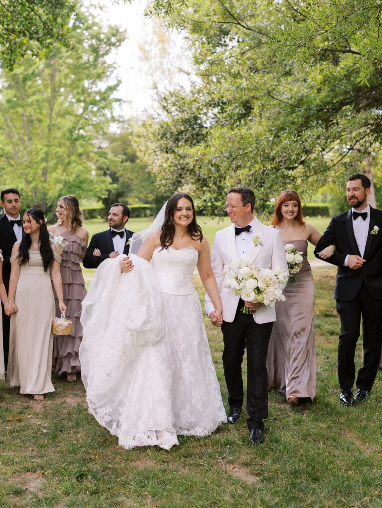 Bride and Groom with wedding party and bridesmaids in Taupe