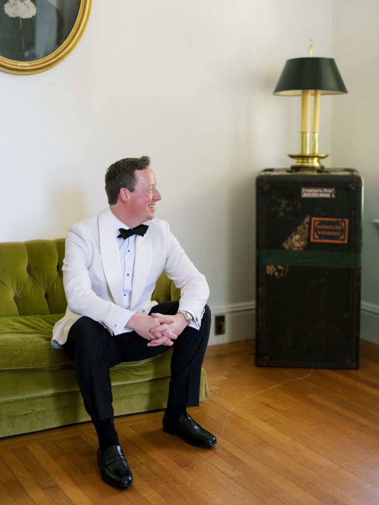 Groom relaxing in the Hill House groom's suite