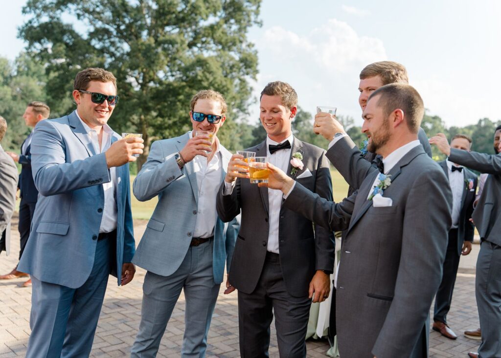 Guys toasting